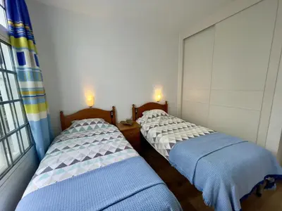 Cama o camas de una habitación en Casa Lindi - Apartment near Puerto Rico beach