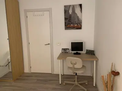 Una televisión o centro de entretenimiento en CoLiving El Toro