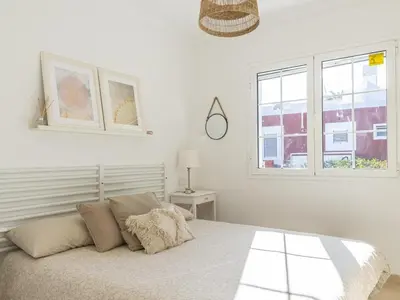 Cama o camas de una habitación en GuestReady - Los Tunos 76 - FC