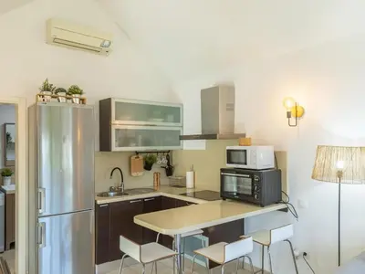 Una cocina o zona de cocina en GuestReady - Los Tunos 76 - FC