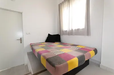 Cama o camas de una habitación en Piso Reformado