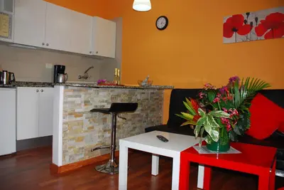 Una cocina o zona de cocina en Apartamentos Las Dunas