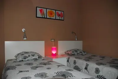 Cama o camas de una habitación en Apartamentos Las Dunas