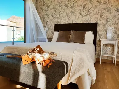 Cama o camas de una habitación en Apartamento Starlight La Aldea I