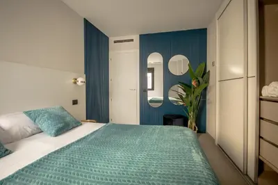 Cama o camas de una habitación en VV Luxury Tropical Blue 
