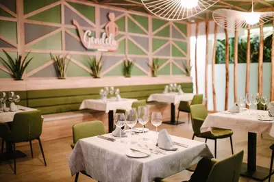 Un restaurante o sitio para comer en Club Maspalomas Suites & Spa - Adults Only
