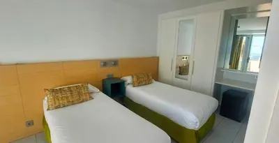 Cama o camas de una habitación en Servatur Riosol