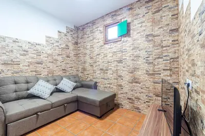 Una televisión o centro de entretenimiento en Faro de Sardina - 3 Bed - Coast - WIFI