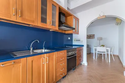 Una cocina o zona de cocina en Home2Book Terrace&Pool Apartment Playa del Inglés