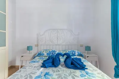 Cama o camas de una habitación en Home2Book Terrace&Pool Apartment Playa del Inglés