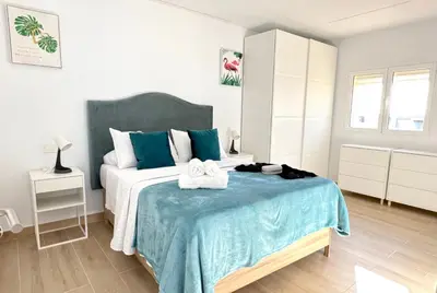 Cama o camas de una habitación en Suites Verano Azul