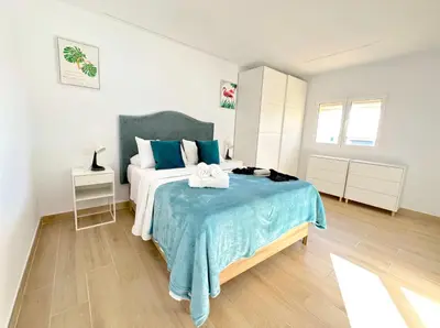 Cama o camas de una habitación en Suites Verano Azul