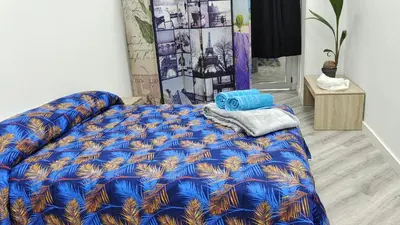 Cama o camas de una habitación en Lodge El Muelle Arinaga