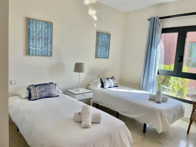 Cama o camas de una habitación en HomeForGuest Villa 5 in Salobre Golf with private pool, garden and great views