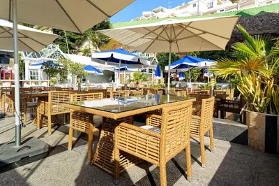 Un restaurante o sitio para comer en Aparthotel Maracaibo