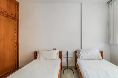Cama o camas de una habitación en Spacious apartment El Tablero