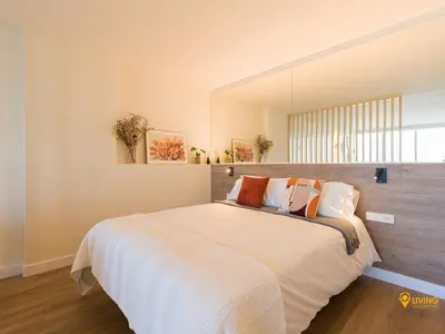 Cama o camas de una habitación en Living Las Canteras Homes - STYLISH BEACHFRONT