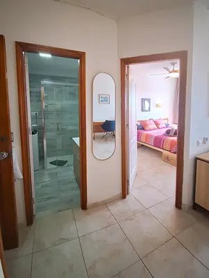 Cama o camas de una habitación en Casa Iguazu - At the center of Playa del Inglés
