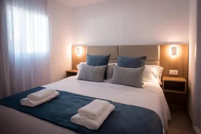 Cama o camas de una habitación en MAR BIANCO - Gay Men Only