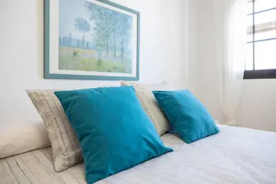Cama o camas de una habitación en Villa Garoé