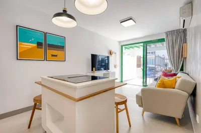 Una televisión o centro de entretenimiento en Las Calas San Agustín - Con acceso a piscina
