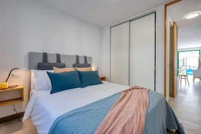 Cama o camas de una habitación en Las Calas San Agustín - Con acceso a piscina