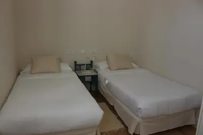 Cama o camas de una habitación en La Casona de Galdós