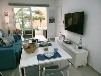 Una televisión o centro de entretenimiento en Casa Lumière - A little gem in Maspalomas