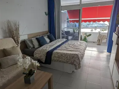 Cama o camas de una habitación en Beachfront studio apartment Puerto Rico