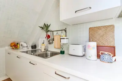 Una cocina o zona de cocina en Living Las Canteras Homes - A HOME AWAY FROM HOME