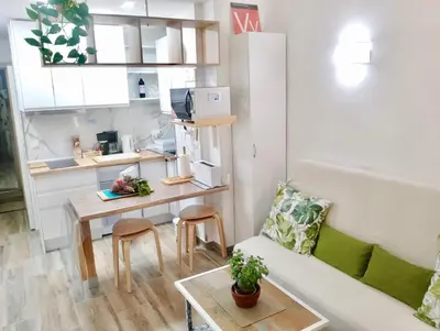 Una cocina o zona de cocina en Estudio Bahia Playa de las Canteras