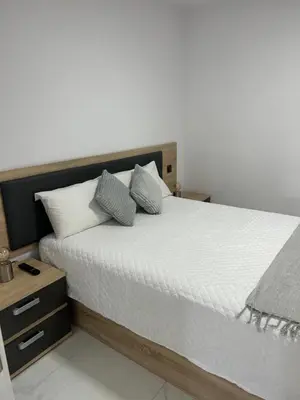Cama o camas de una habitación en ENZO SUITE