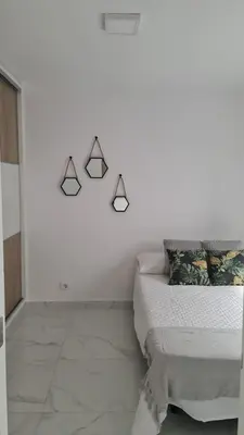Cama o camas de una habitación en ENZO SUITE