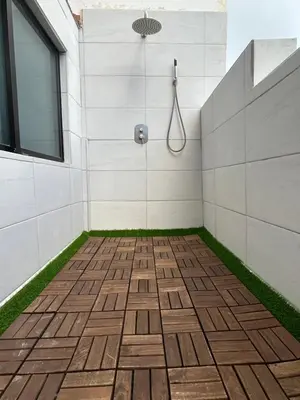 Un baño de ENZO SUITE