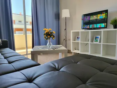 Zona de estar de Las Camelias Apartments
