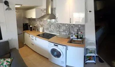 Una cocina o zona de cocina en BONITO BUNGALOW DUNAS DE MASPALOMAS
