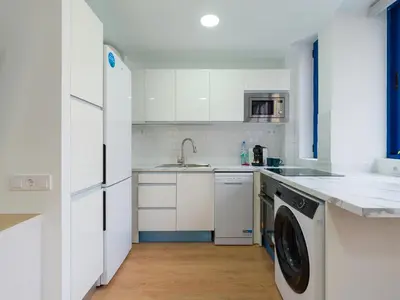 Una cocina o zona de cocina en Suites Garden DALI 14