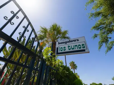 Certificado, premio, señal o documento que está expuesto en Bungalow Tunos Maspalomas