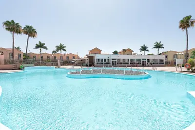 Piscina en o cerca de DUPLEX en GREEN OASIS