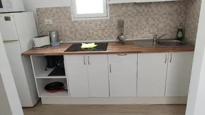 Una cocina o zona de cocina en Apartamento Sol A free parking air conditioning
