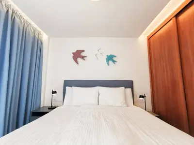 Cama o camas de una habitación en Nice 2 bedroom close to the beach in Maspalomas