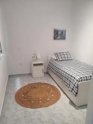 Cama o camas de una habitación en El Prisma