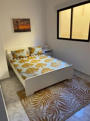 Cama o camas de una habitación en El Prisma