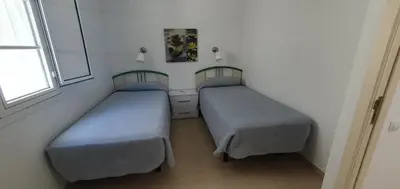 Cama o camas de una habitación en La Venecia de Canarias