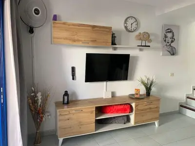Una televisión o centro de entretenimiento en Dúplex Maspalomas