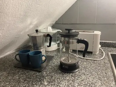 Una cocina o zona de cocina en Dúplex Maspalomas
