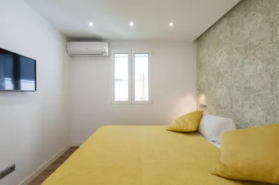 Cama o camas de una habitación en Sunset Dream Apartment - San Agustín