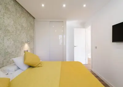 Cama o camas de una habitación en Sunset Dream Apartment - San Agustín