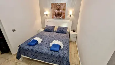 Cama o camas de una habitación en Tamaran 102 - Luxury Garden Apartment