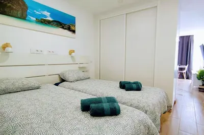 Cama o camas de una habitación en Caribe 530 by CASAS COCODRILO
